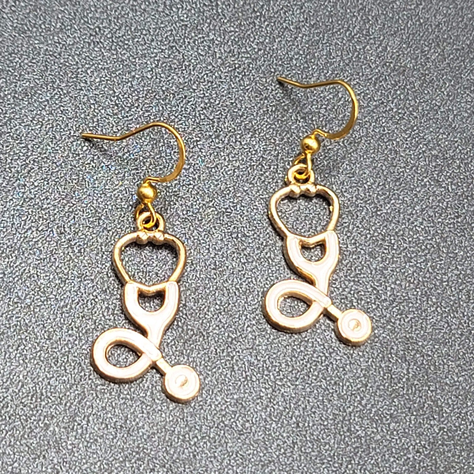 Nurse Pierced Earrings White Enamel Stethoscope Gold tone Dangle 1 1/8"