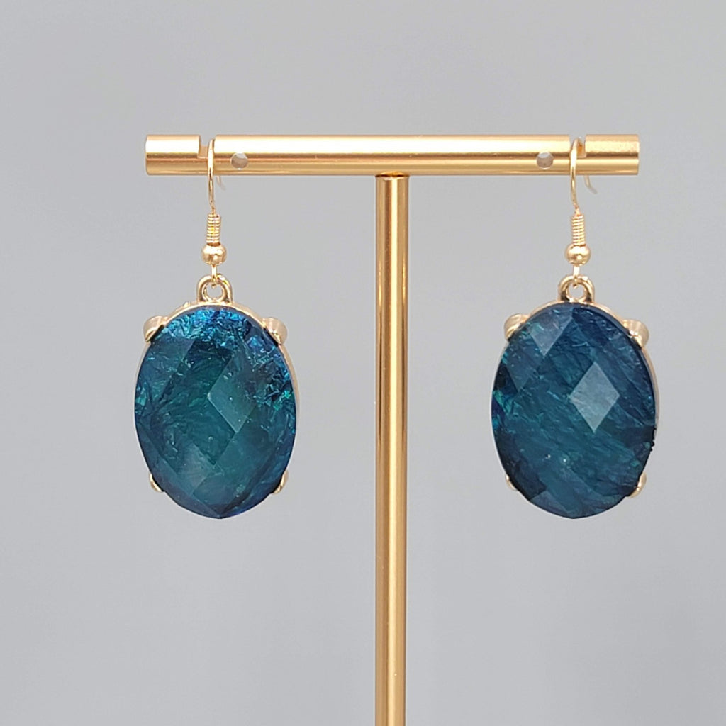Blue Oval Faceted Swirl Resin Pierced Earrings Gold tone Dangle 1.25 in