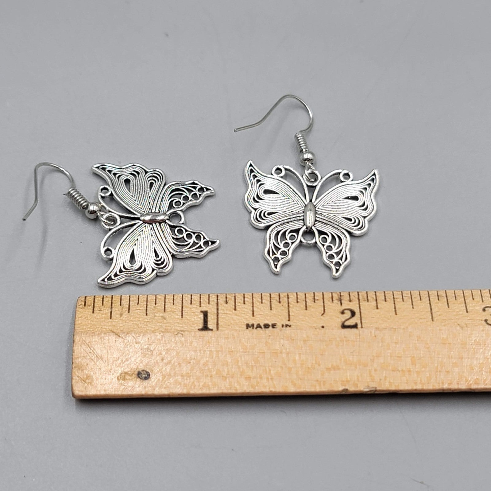 Filigree Butterfly Pierced Earrings Silver tone Dangle 1"