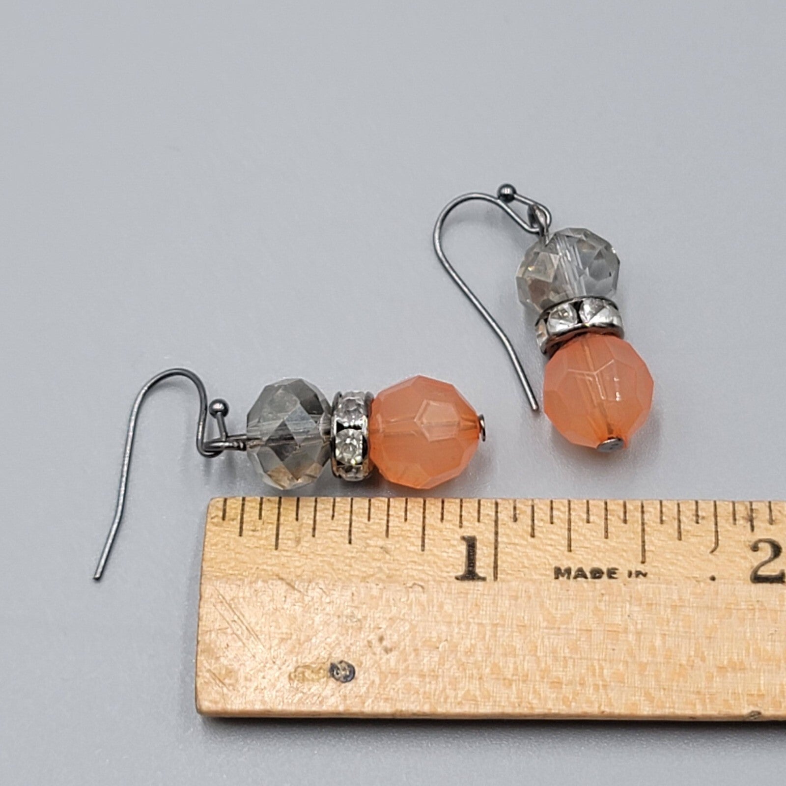 Pierced Earrings Black Metal Peach Clear Crystal Faceted Beads Dangle 1"