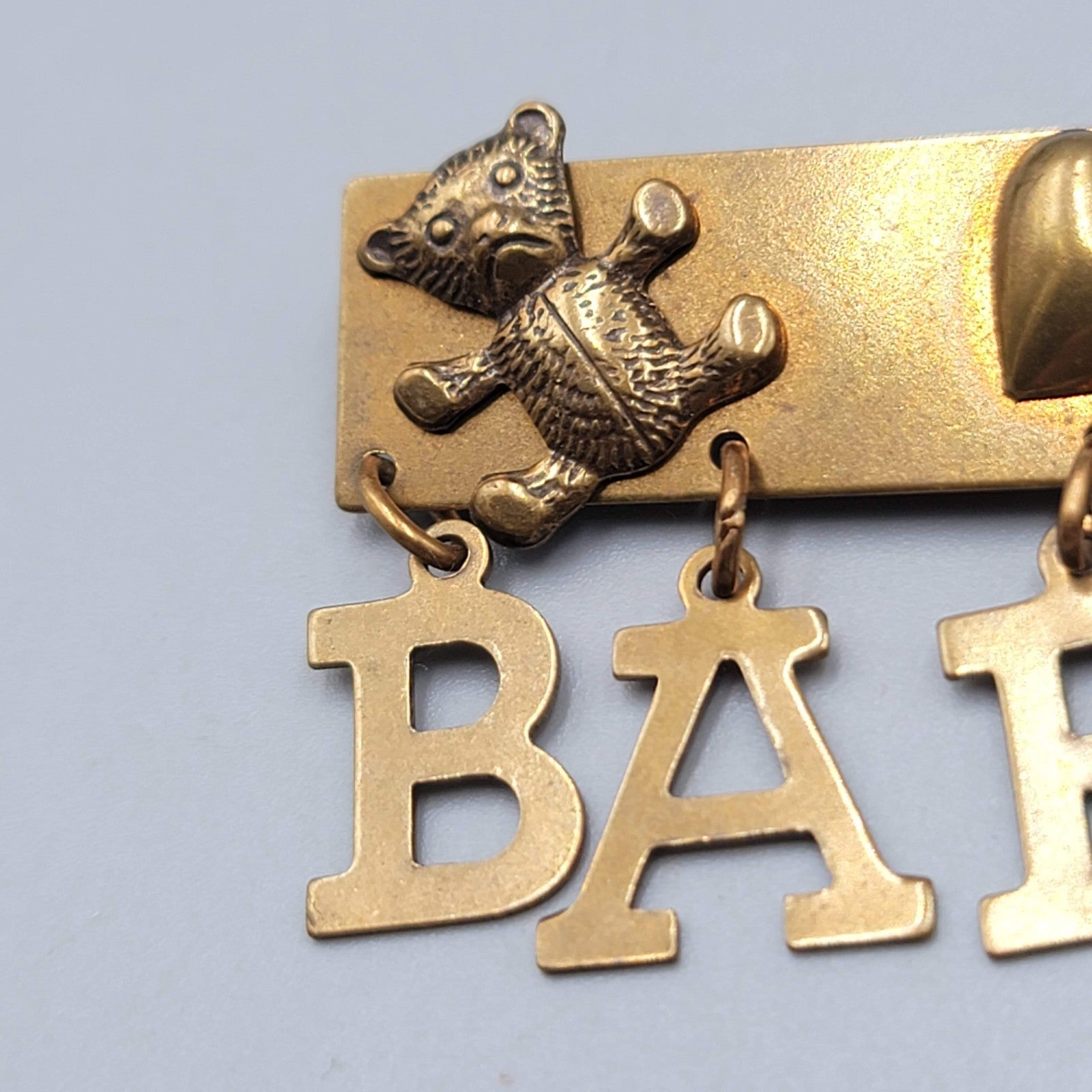 Jan Michaels San Francisco Brooch BABY Charm Dangle Brass 2.25"