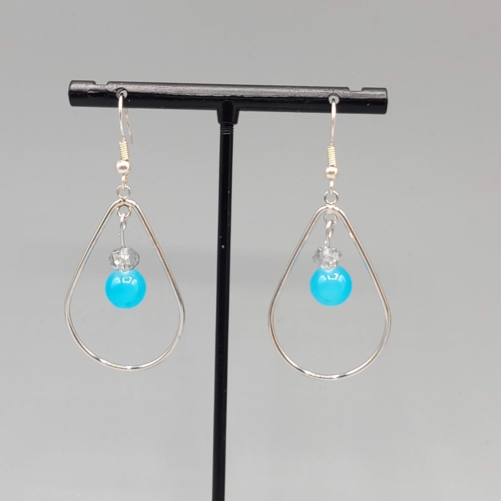 Pierced Earrings Silver tone Teardrop Hoops Blue Bead Dangle 1.5"