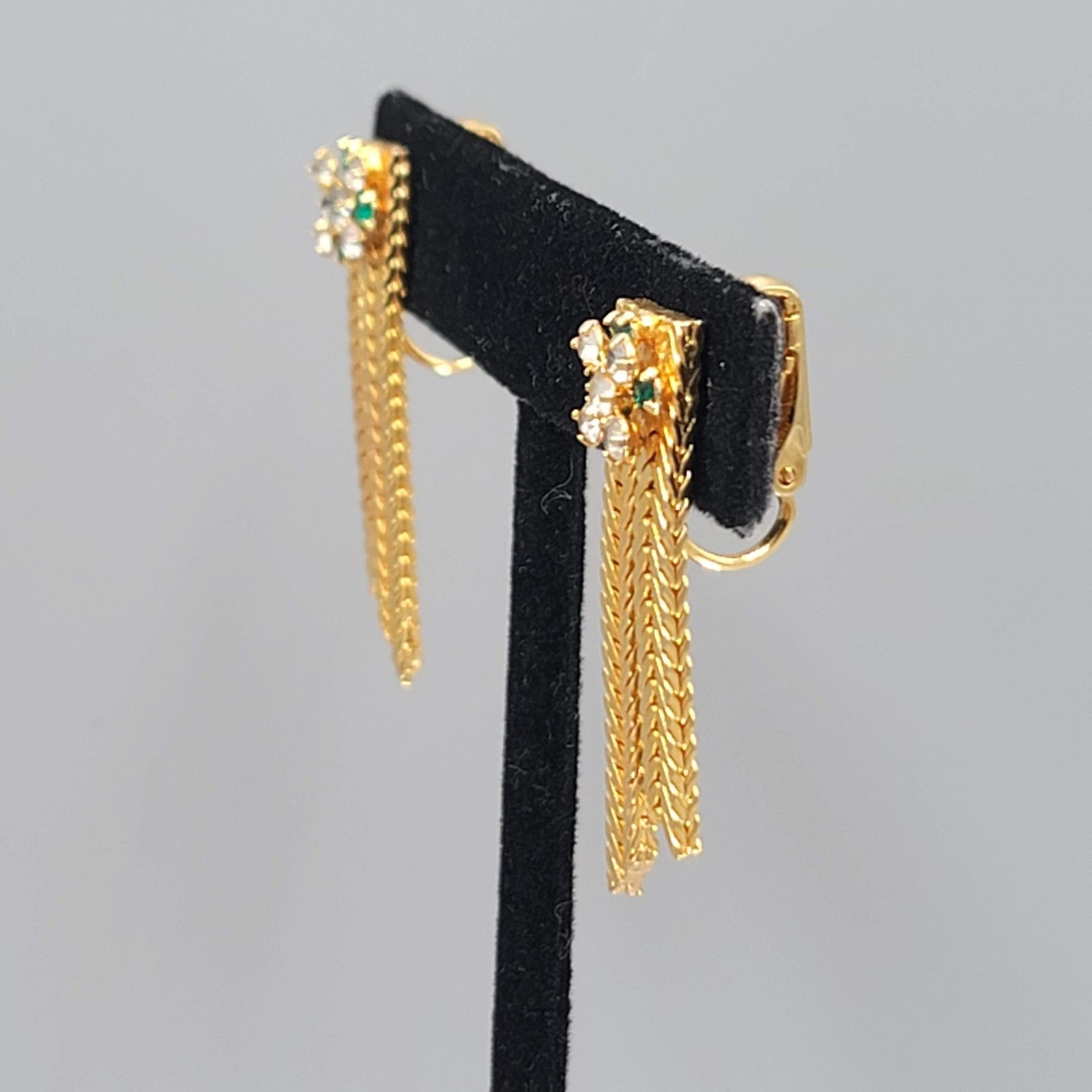 Vintage Green Rhinestone Clip on Earrings Gold tone Herringbone Dangle 1.5 in