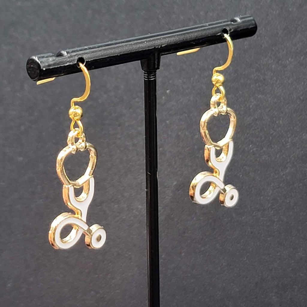 Nurse Pierced Earrings White Enamel Stethoscope Gold tone Dangle 1 1/8"