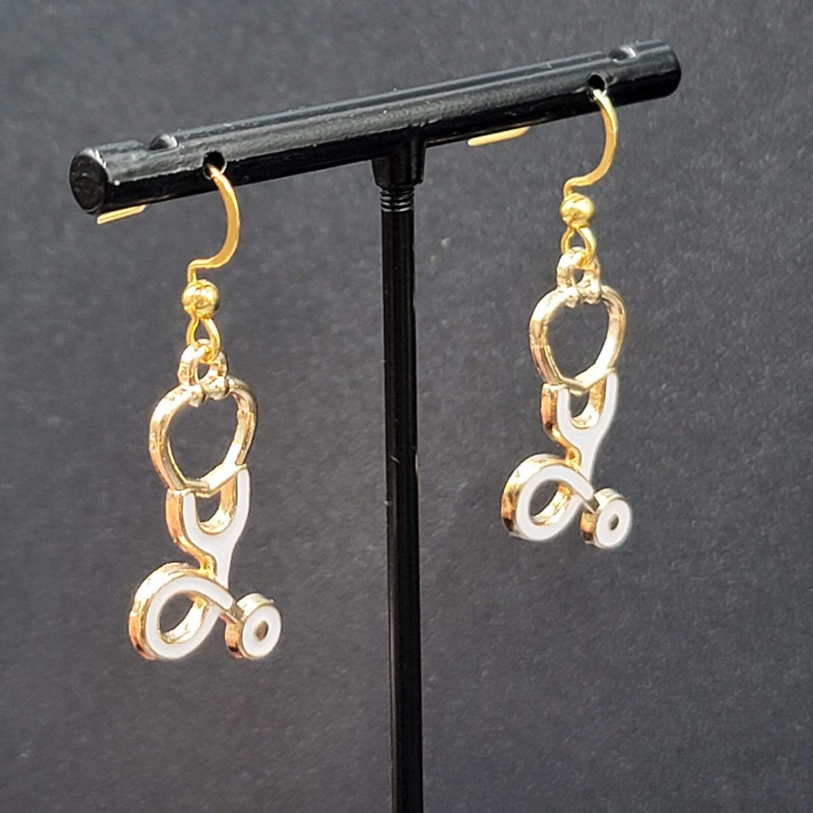 Nurse Pierced Earrings White Enamel Stethoscope Gold tone Dangle 1 1/8"