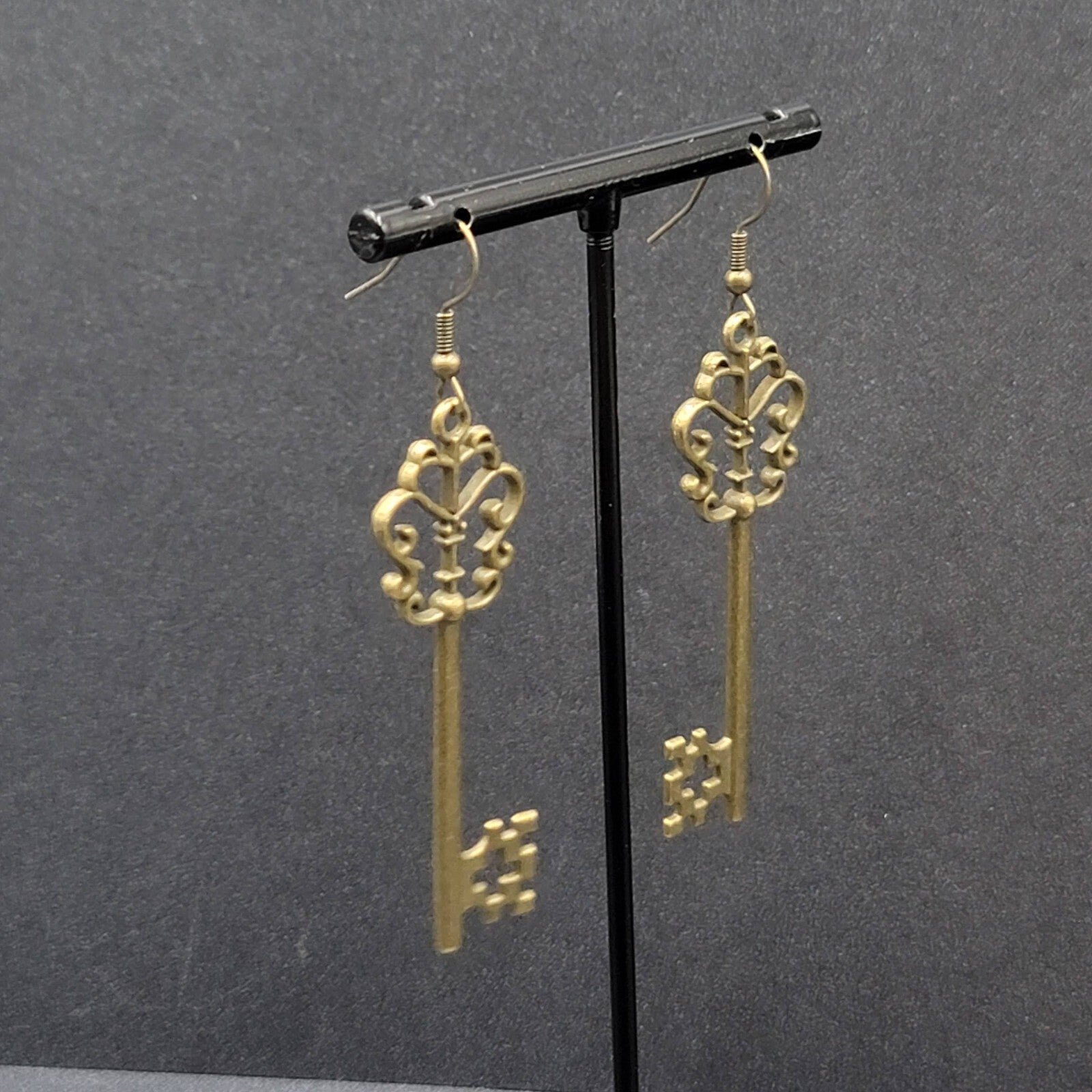 Pierced Earrings Bronze tone Long Antique Skeleton Key Dangle 2.25"