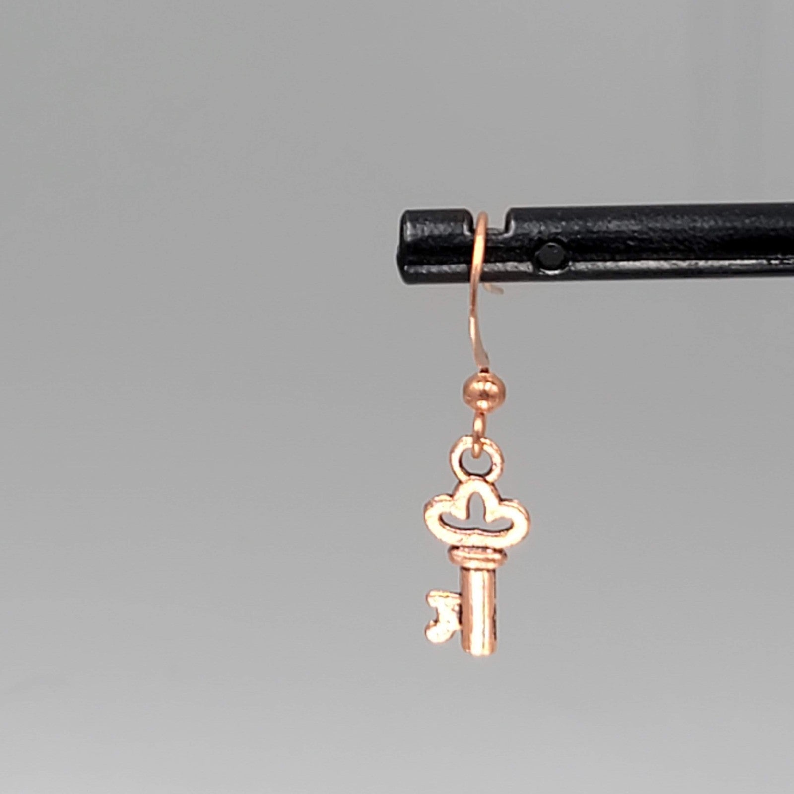 Copper tone Skeleton Key Pierced Earrings Dangle 5/8"