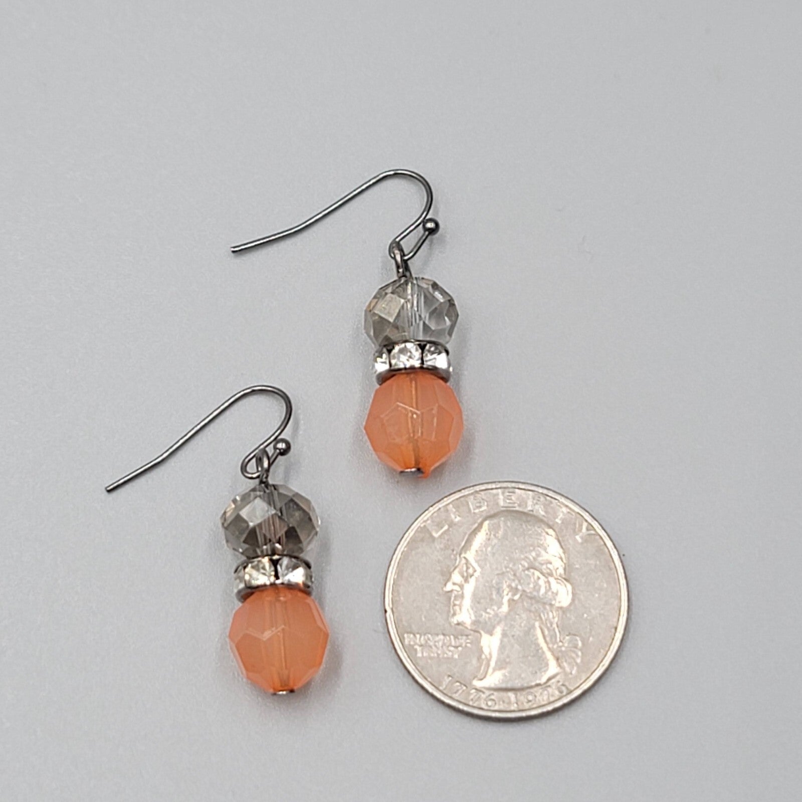 Pierced Earrings Black Metal Peach Clear Crystal Faceted Beads Dangle 1"
