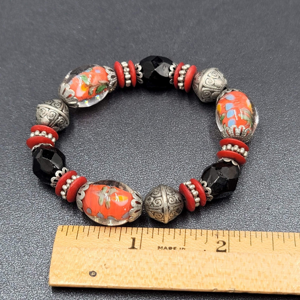 Beaded Bracelet Art Glass Red Black Silver tone Embossed Beads Elastic 6"