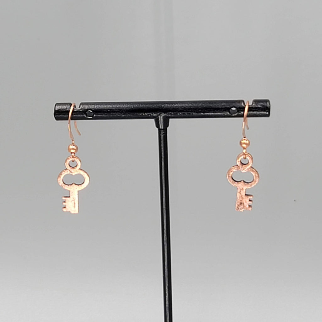 Small Copper tone Skeleton Key Pierced Earrings Dangle 5/8"