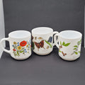 Vtg White Milk Glass Coffee Mugs Made in France Lot of 3 Butterfly Flowers Plant