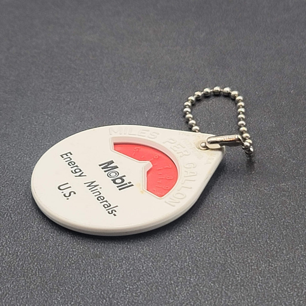 VINTAGE MOBIL ENERGY MINERALS US MILES PER GALLON ADVERTISING KEYCHAIN