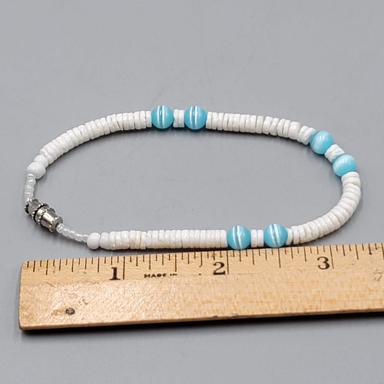 Blue Cats Eye Bead Puka Shell Bracelet 7.25"