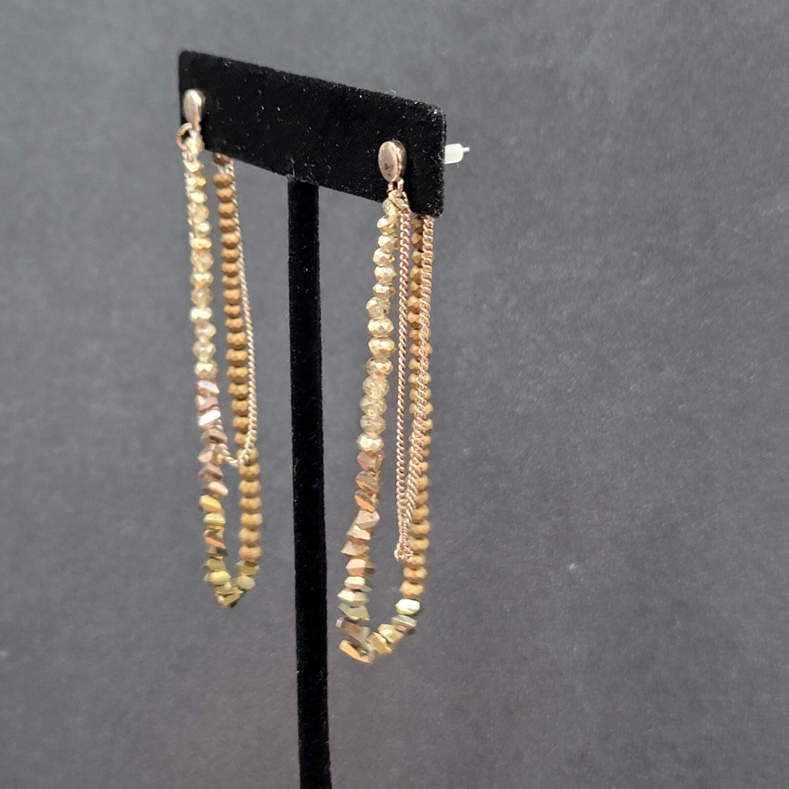 Pierced Earrings Gold tone Small Faceted Beads Dangle Loop To Back 3.25"