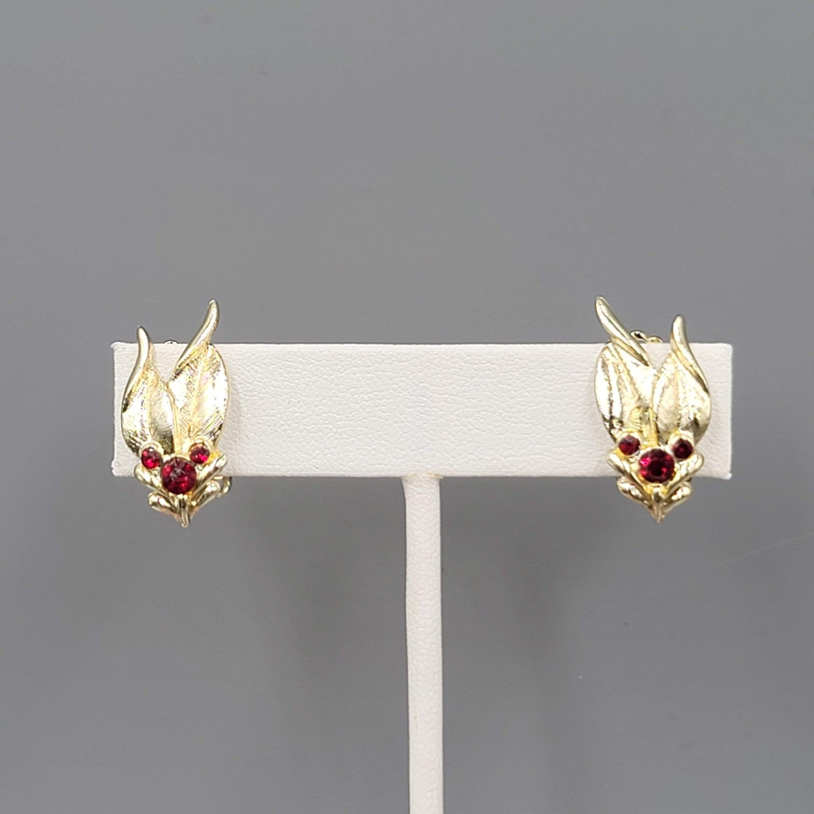 Vintage Red Rhinestone Clip on Earrings Gold tone Leaves 7/8"