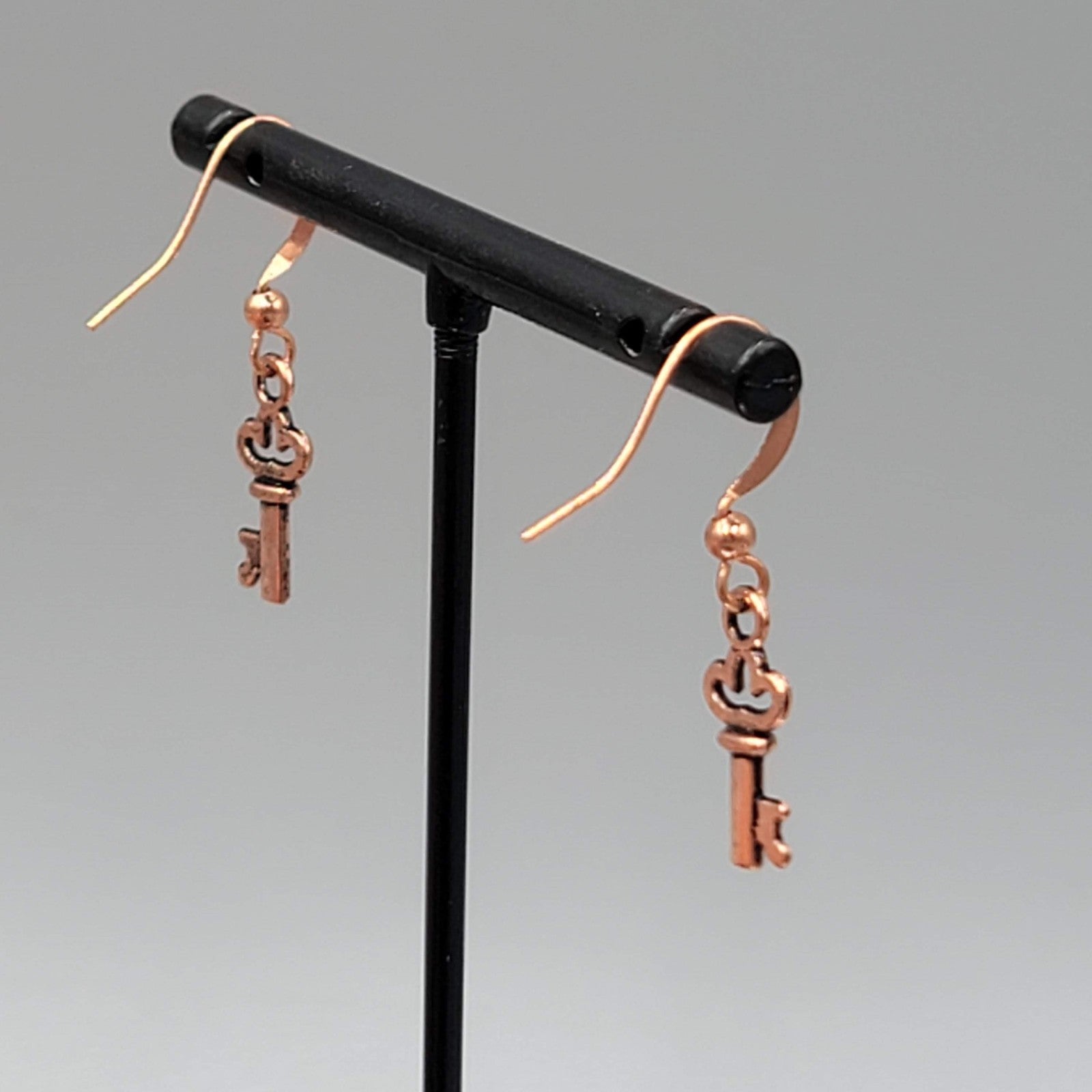 Copper tone Skeleton Key Pierced Earrings Dangle 5/8"