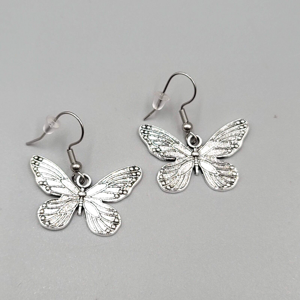 Butterfly Pierced Earrings Silver tone Embossed Dangle 3/4"
