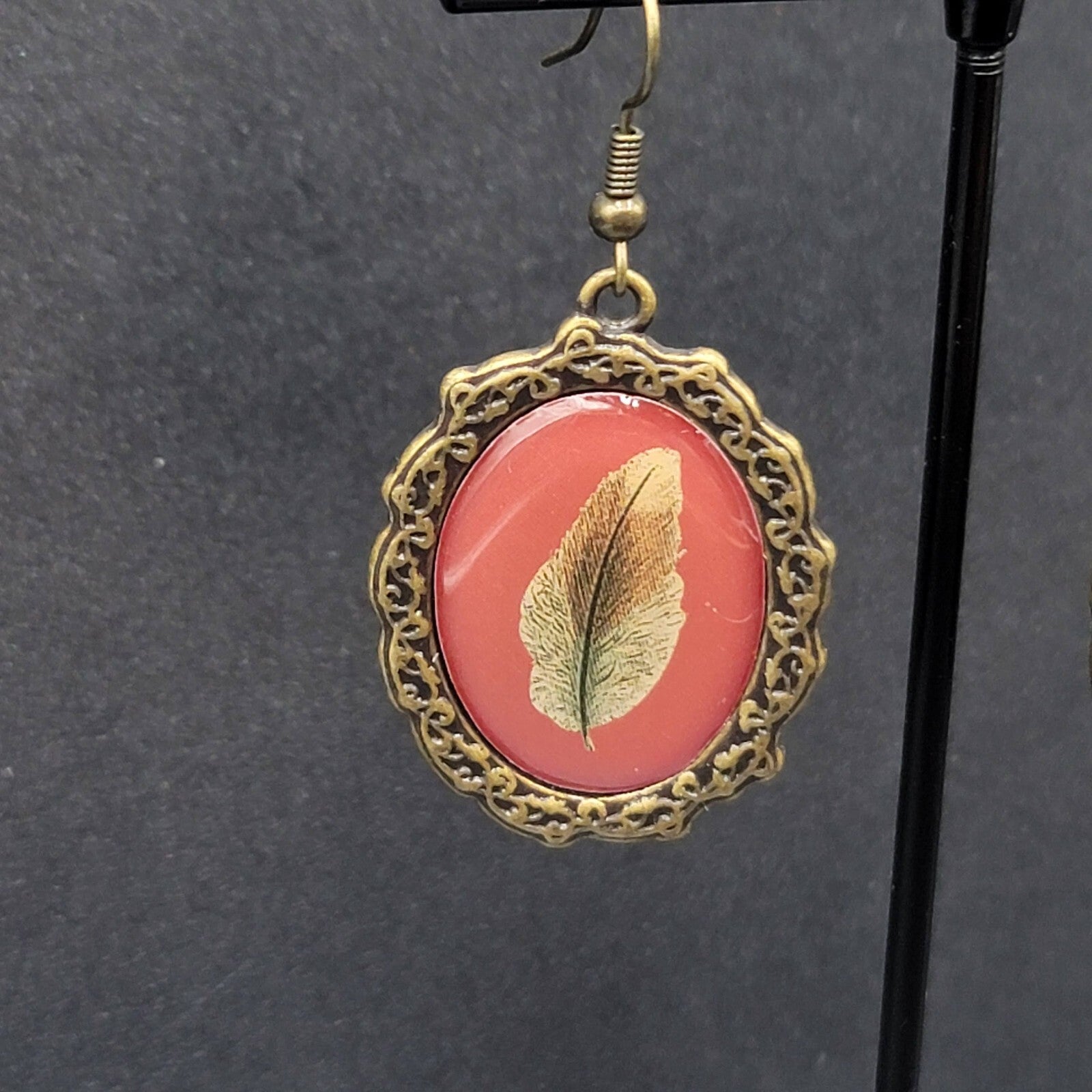 Pierced Earrings Bronze tone Oval Dangle Leaf Design Dangle 1 3/8"