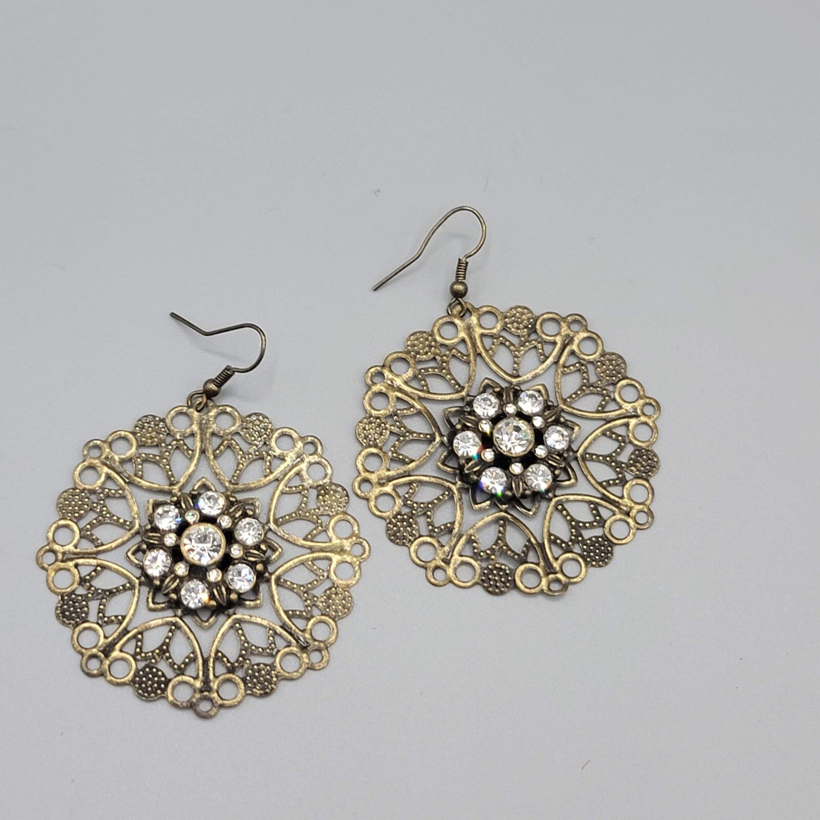 Pierced Earrings Bronze tone Large Metal Filigree Rhinestone Center Boho 1.75"