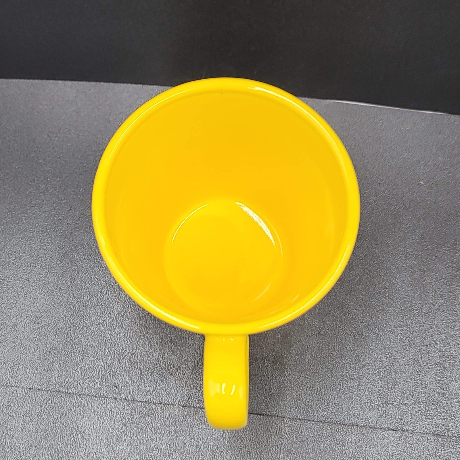 Torpedo Coffee Mug Cup Yellow Winky Face iti