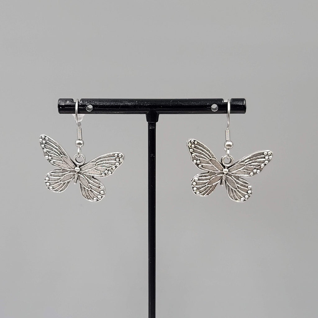Butterfly Pierced Earrings Silver tone Embossed Dangle 3/4"