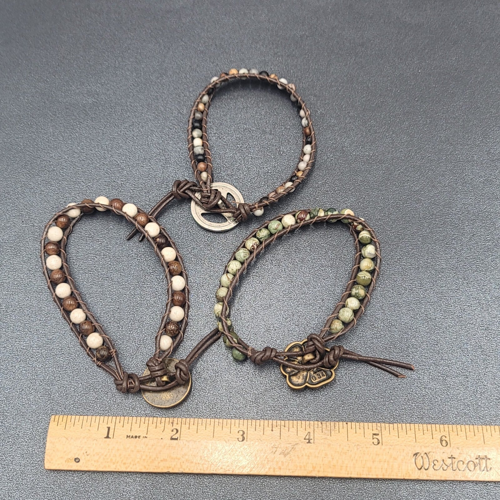 Lot of 3 Bracelets Stone Beads Flower Peace Sign Cord Bronze tone Clasp