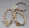 Lot of 3 Bracelets Stone Beads Flower Peace Sign Cord Bronze tone Clasp