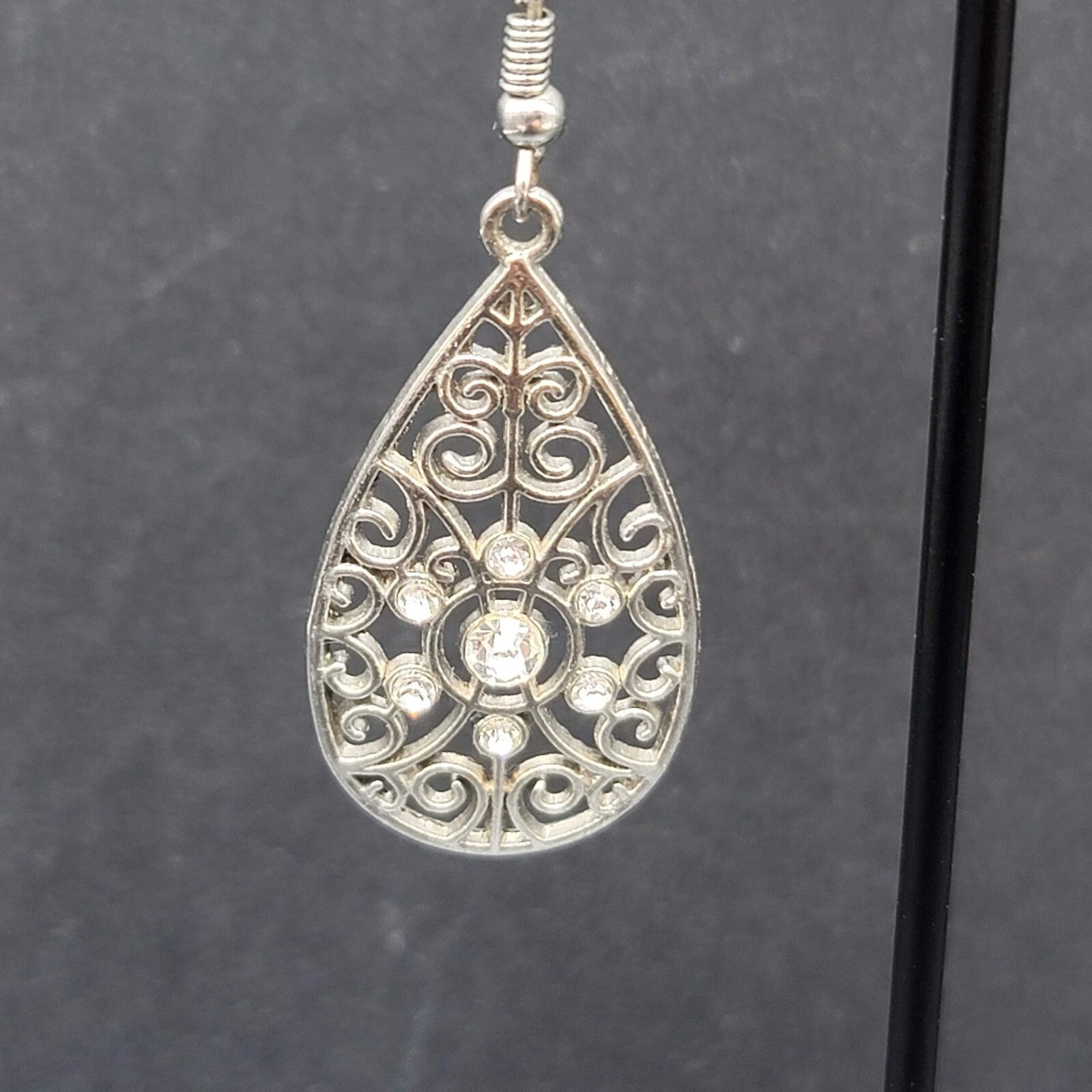 Pierced Earrings Silver tone Rhinestone Open Work Teardrop Dangle 1.25"