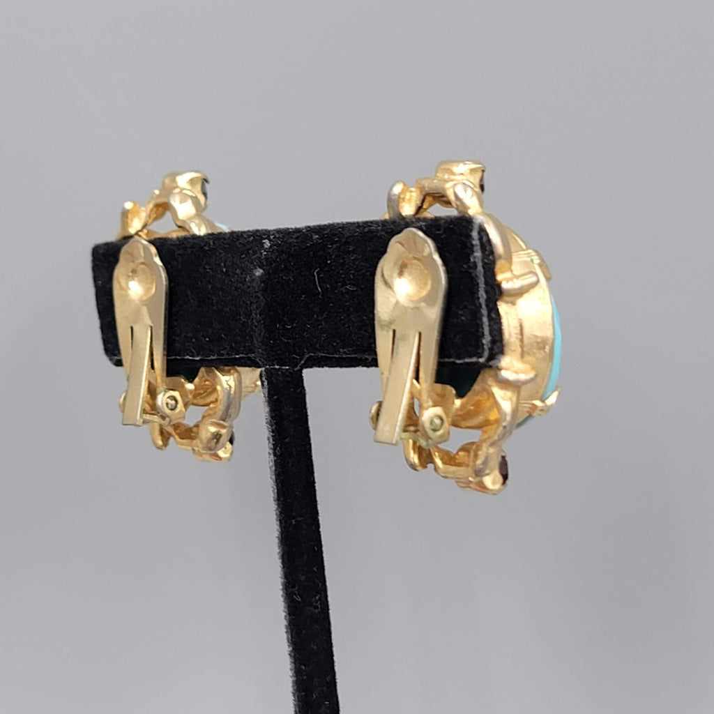 Vintage Blue Art Glass Clip on Earrings Gold tone Black Rhinestone 1.25 in
