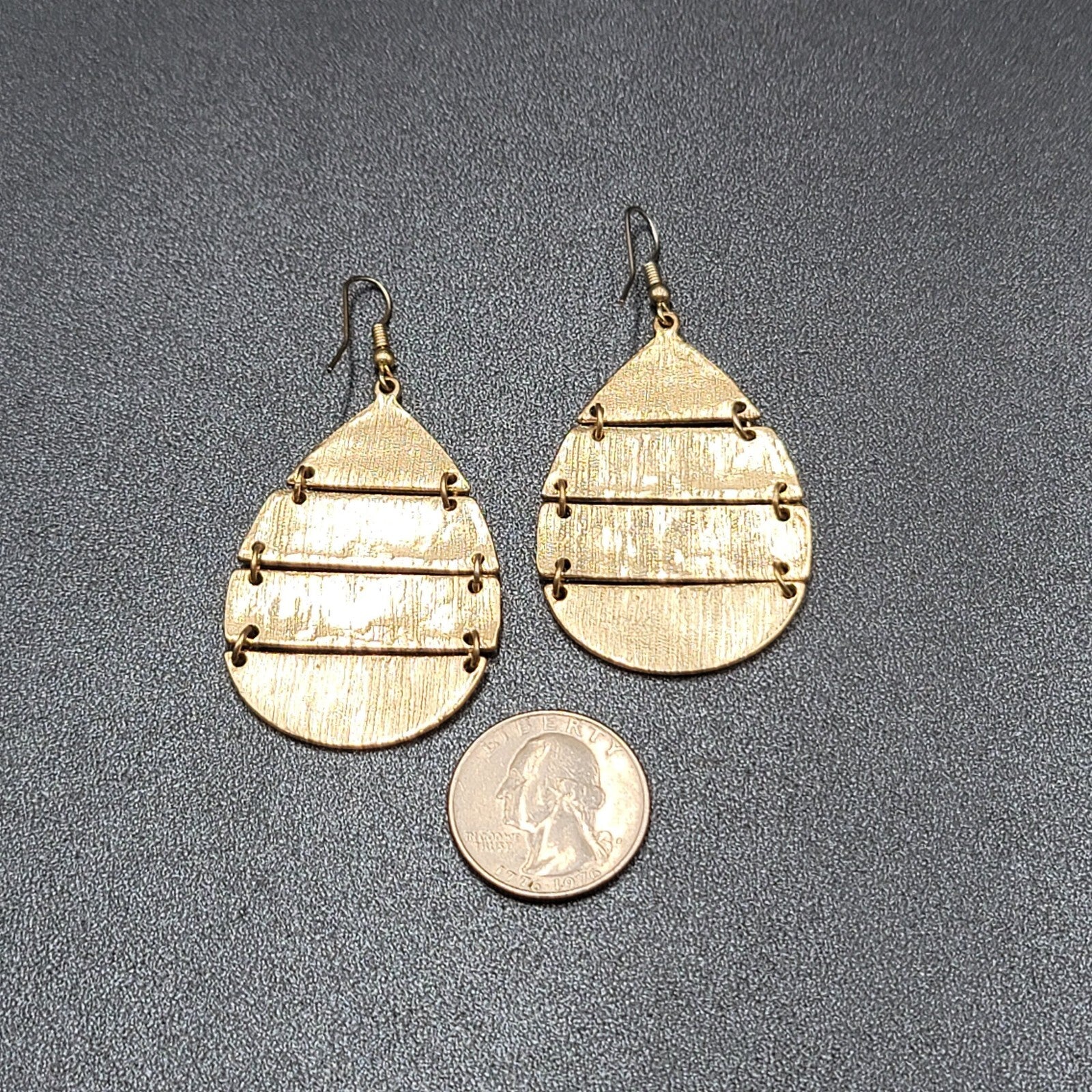 Pierced Earrings Gold tone Articulated Metal Teardrop Leopard Print Dangle 2"