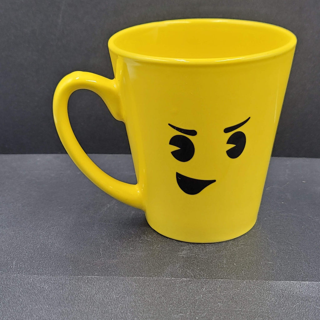 Torpedo Coffee Mug Cup Yellow Winky Face iti