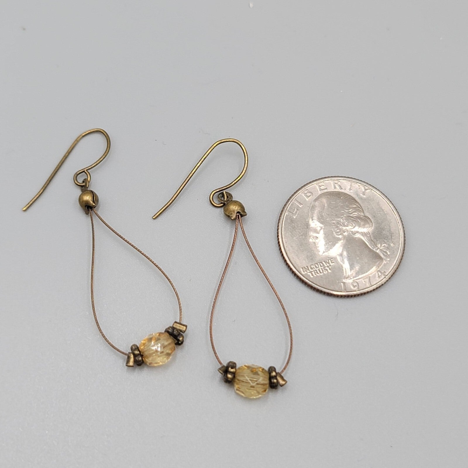Pierced Earrings Bronze tone Teardrop Wire Yellow Glass Bead Dangle 1.5"