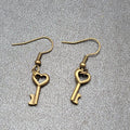New Pierced Earrings Bronze tone Heart Skeleton Key Dangle 5/8"