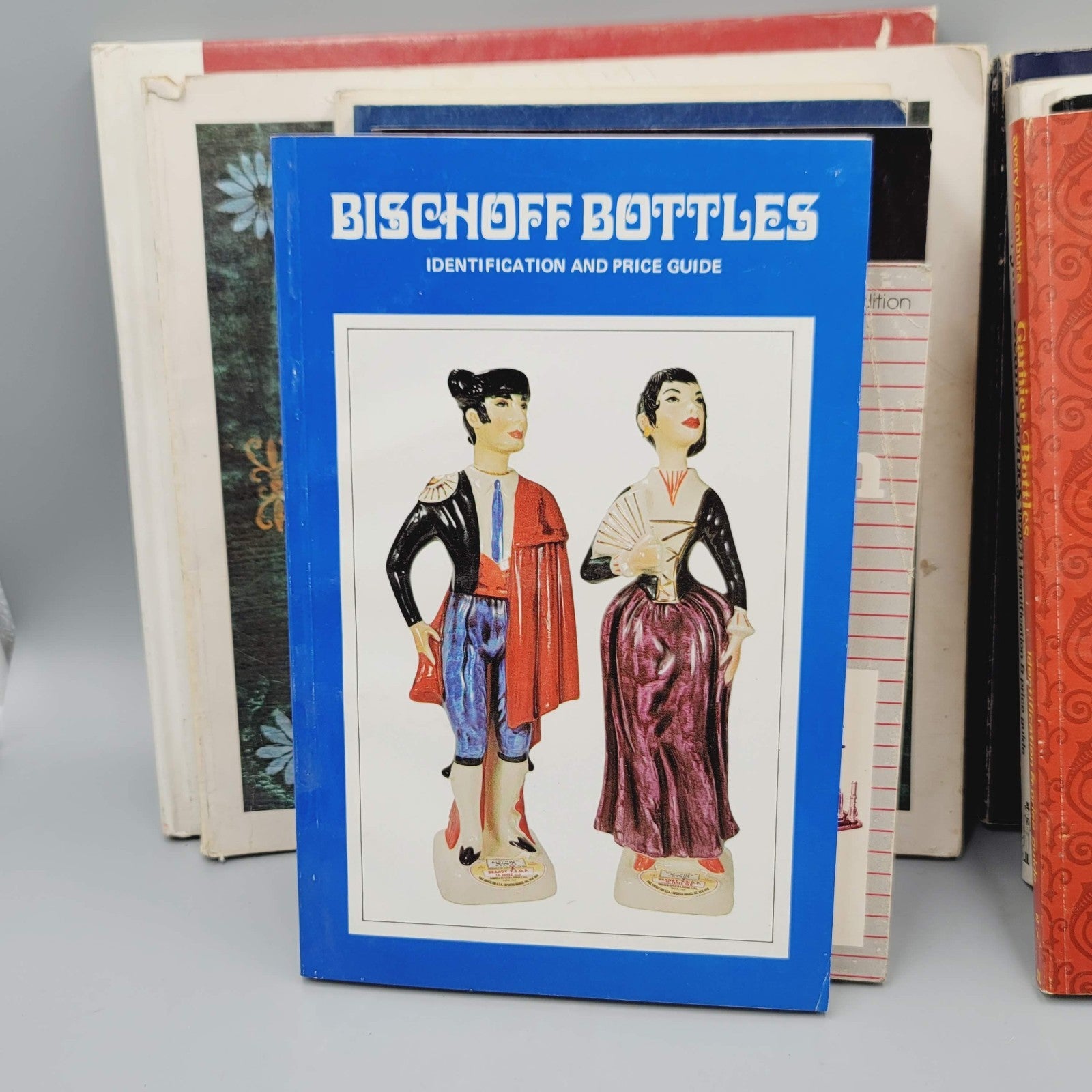 Jim Beam Bottles Collector Books Lot of 13 and Other Collectible Decanters
