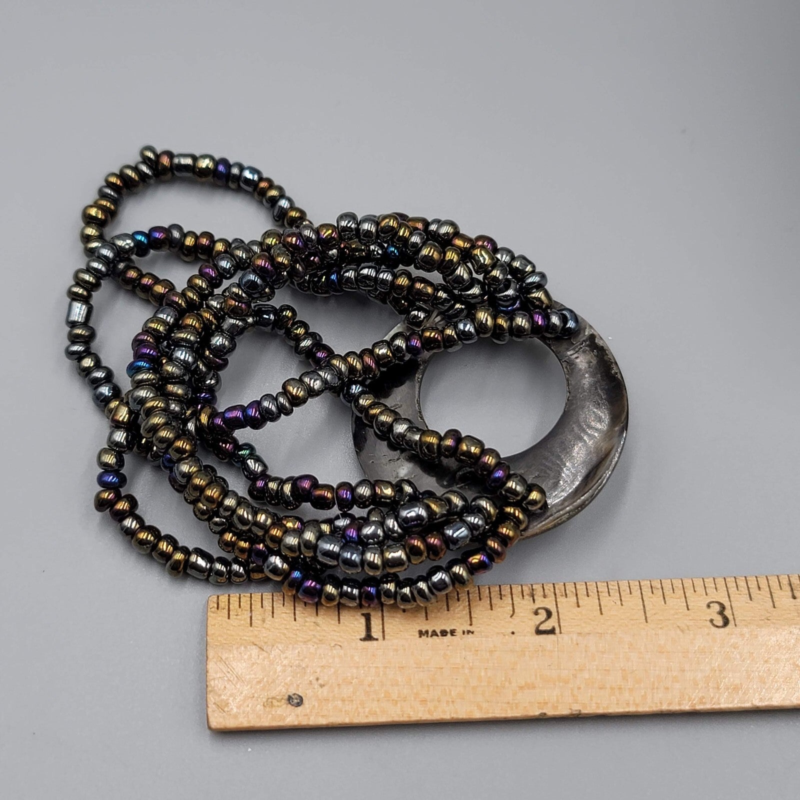 Multi Strand Glass Seed Bead Bracelet with Abalone Shell Ring Accent 6.75 in