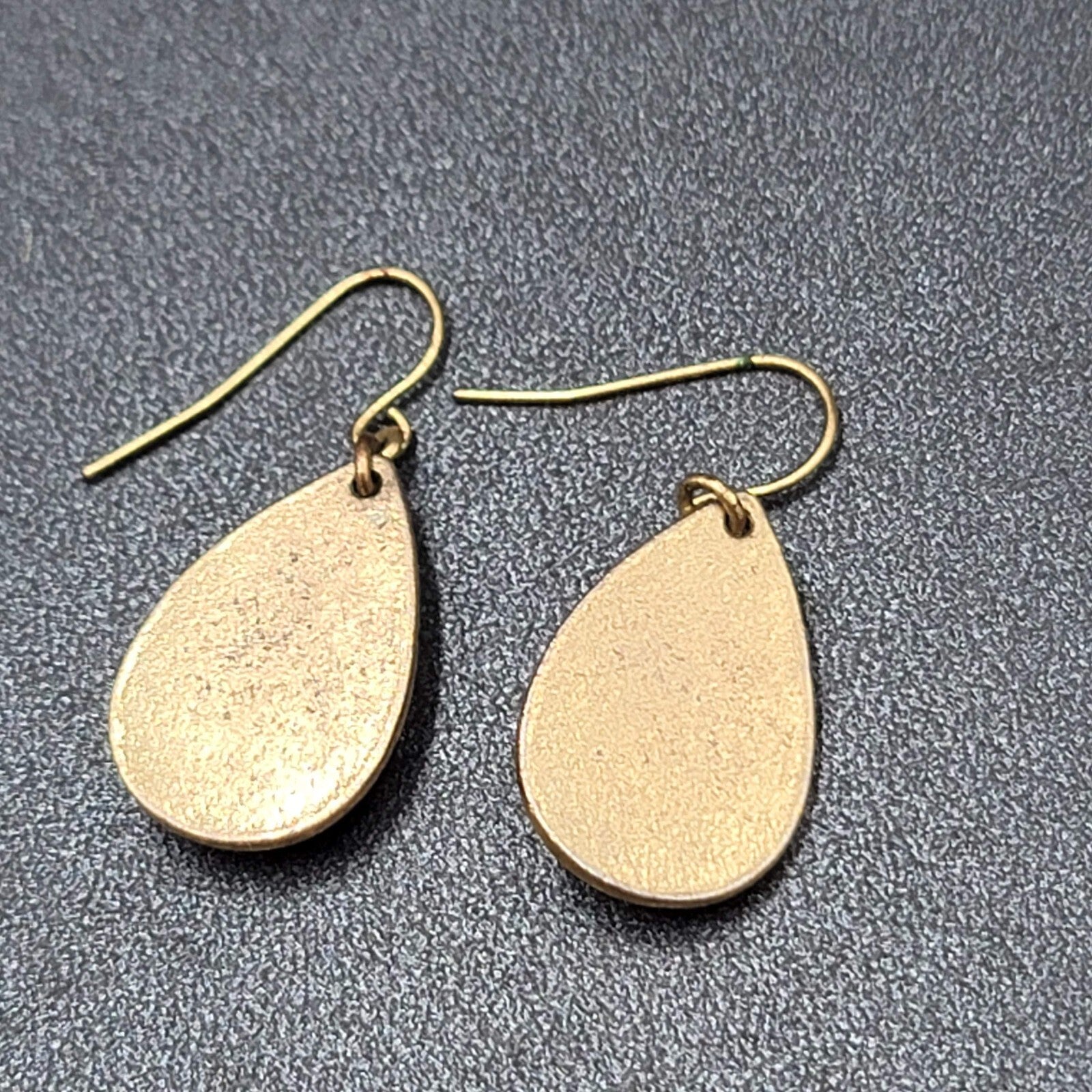 Pierced Earrings Antiqued Gold tone Teardrop Faceted Red Accent 1"