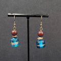 Pierced Earrings Bronze tone Art Glass Blue Bead Dangle 1.25"