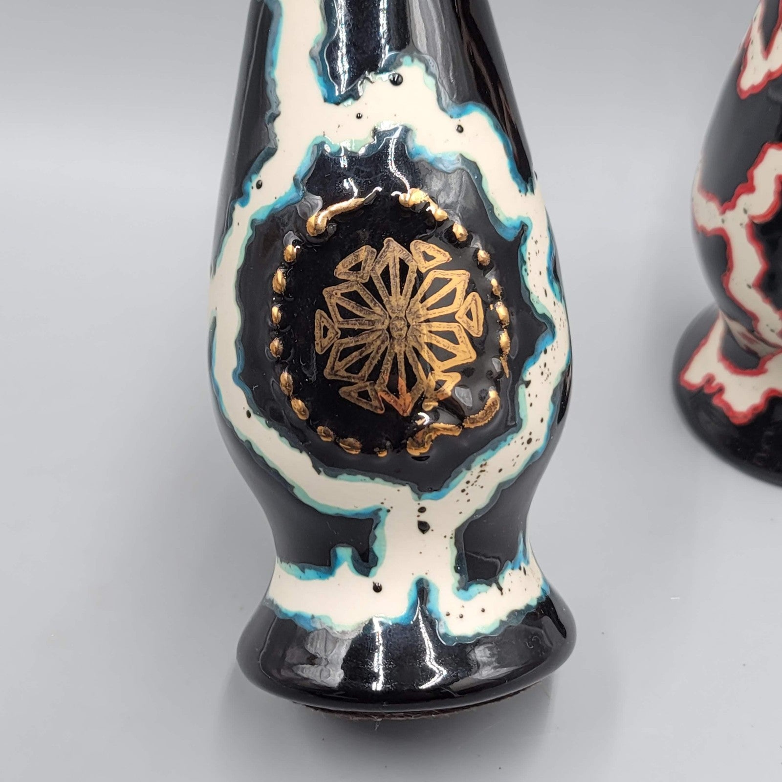 Vintage 1981 Jim Beam Regal China Lightning Paperweight Pair Black Red Teal