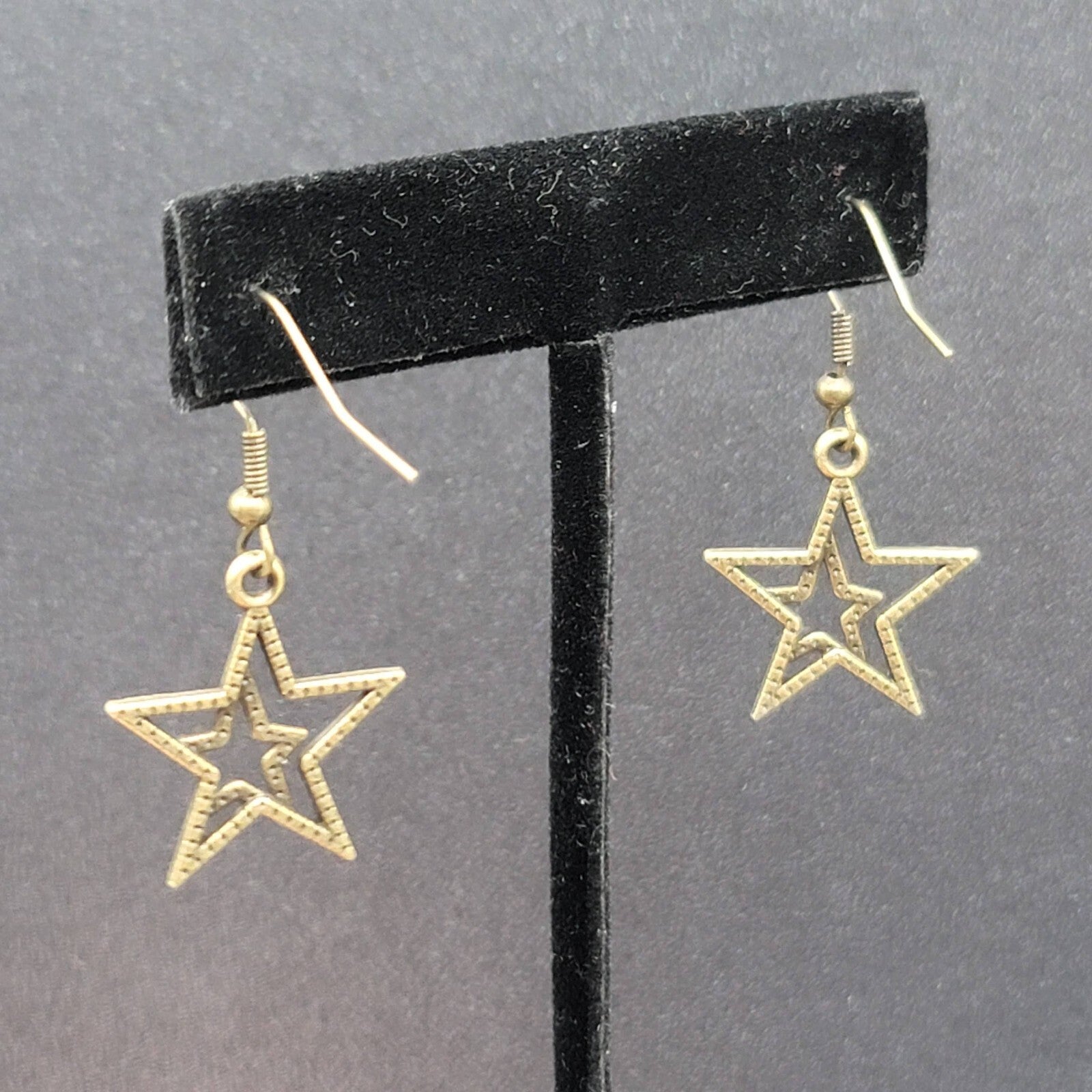 Pierced Earrings Bronze tone Double Open Star Dangle 7/8"