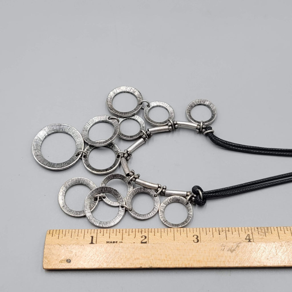 Multiple Open Rings Necklace Embossed Silver tone Black Cord 18"