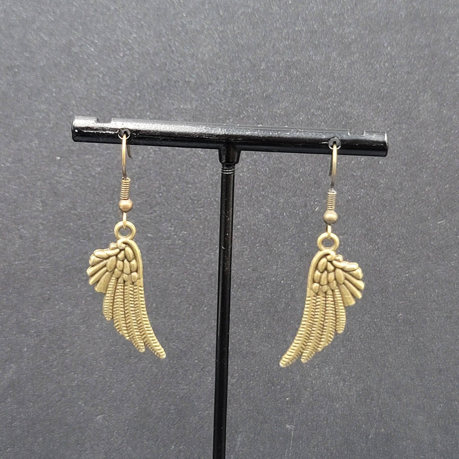 Feather Wings Pierced Earrings Bronze tone Metal Embossed Dangle 1 1/8"