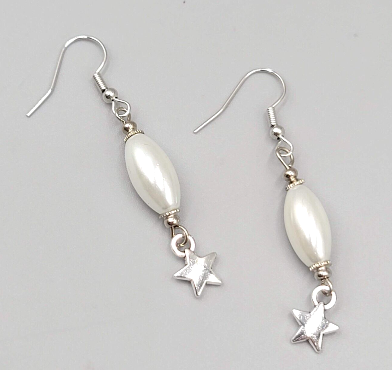 White Satin Finish Bead Star Pierced Earrings Silver tone Dangle 1.5"
