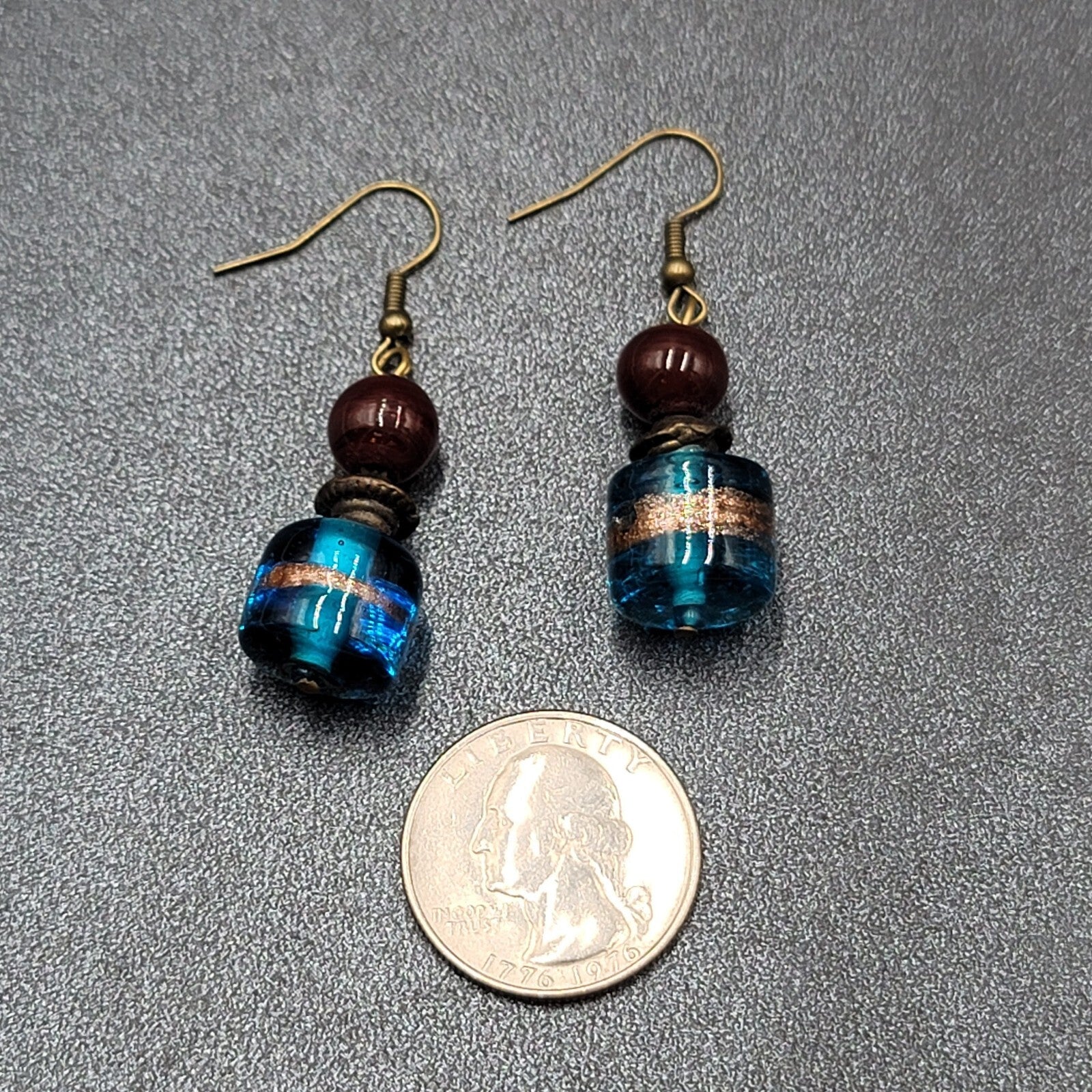 Pierced Earrings Bronze tone Art Glass Blue Bead Dangle 1.25"