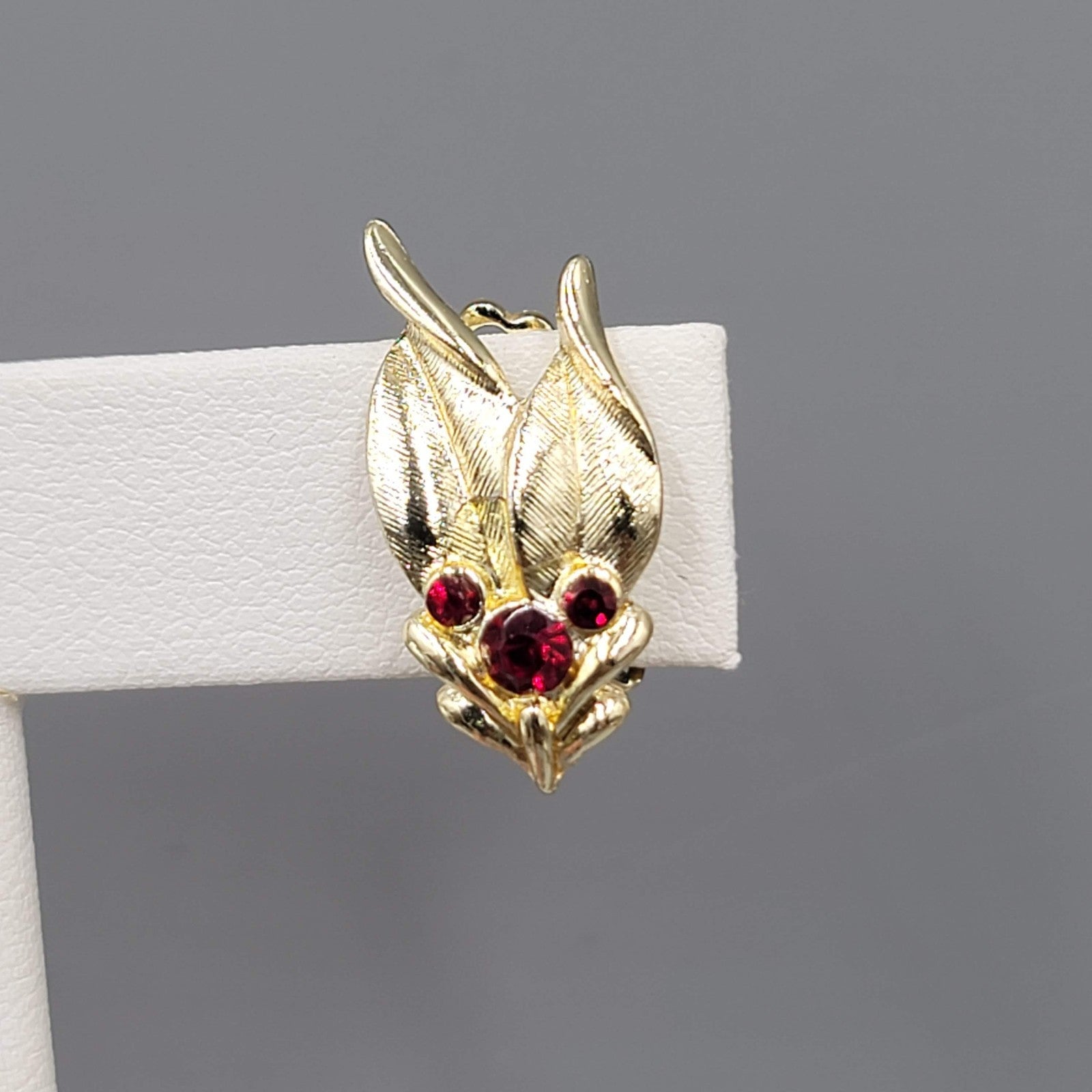 Vintage Red Rhinestone Clip on Earrings Gold tone Leaves 7/8"