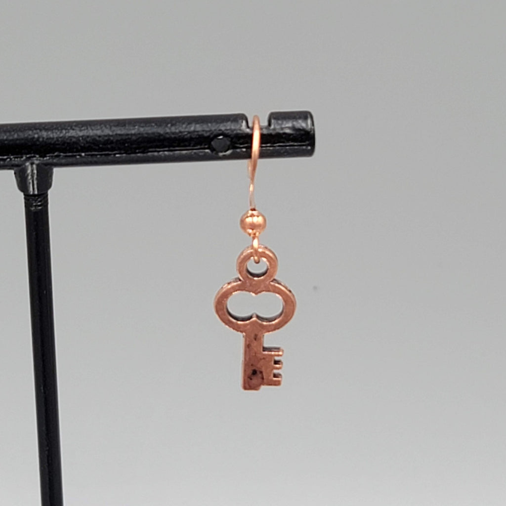 Small Copper tone Skeleton Key Pierced Earrings Dangle 5/8"
