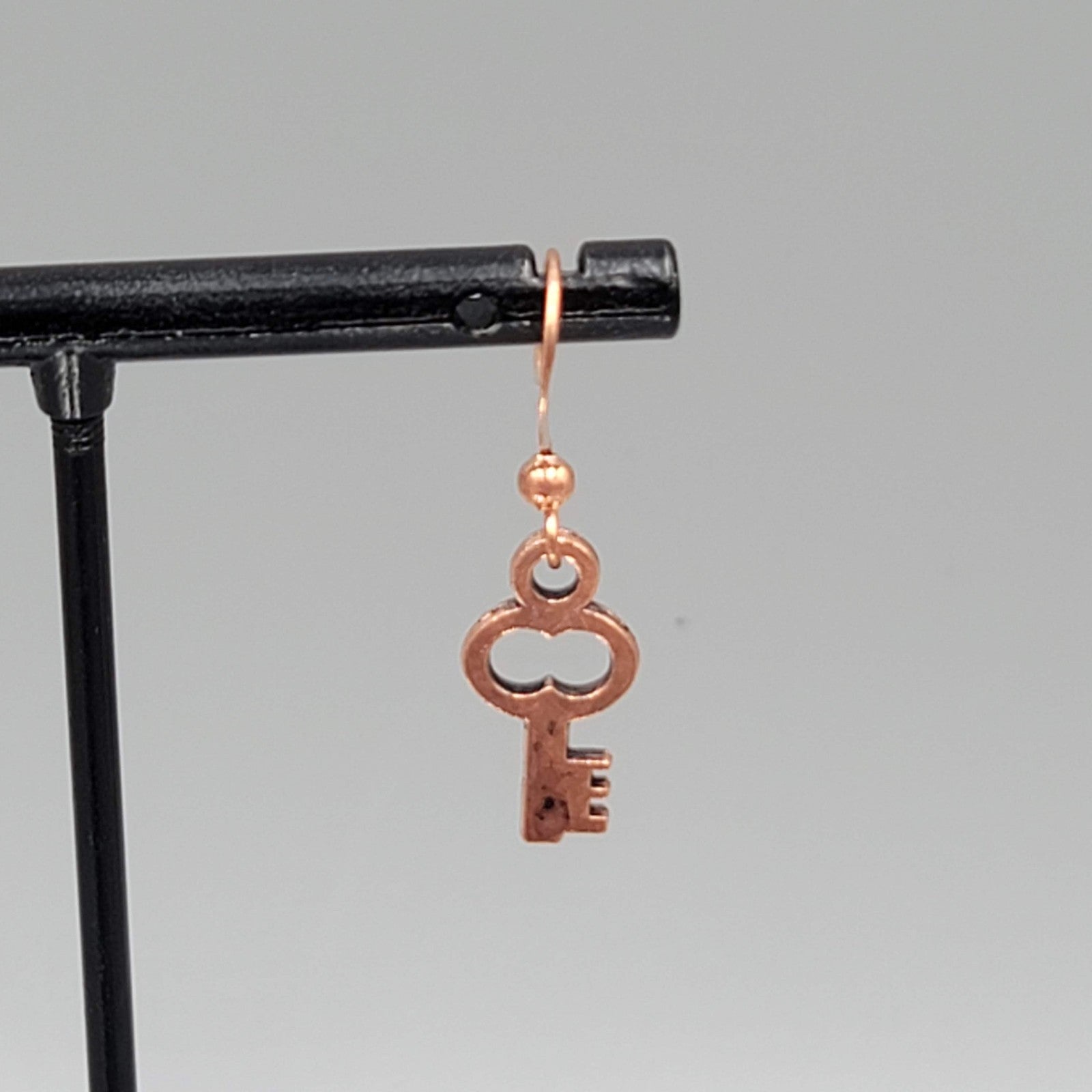 Small Copper tone Skeleton Key Pierced Earrings Dangle 5/8"