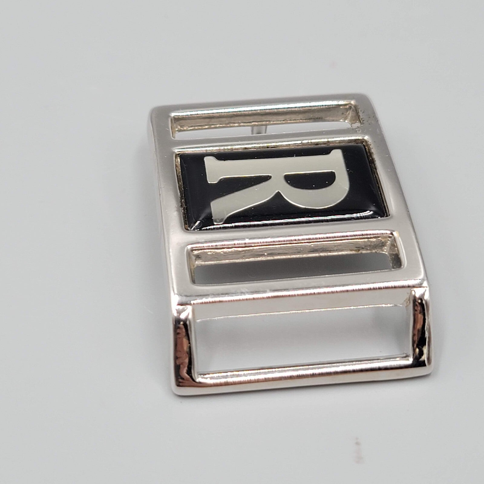 1983 AVON VINTAGE BELT BUCKLE INITIAL R SILVER TONE METAL BLACK ACCENT
