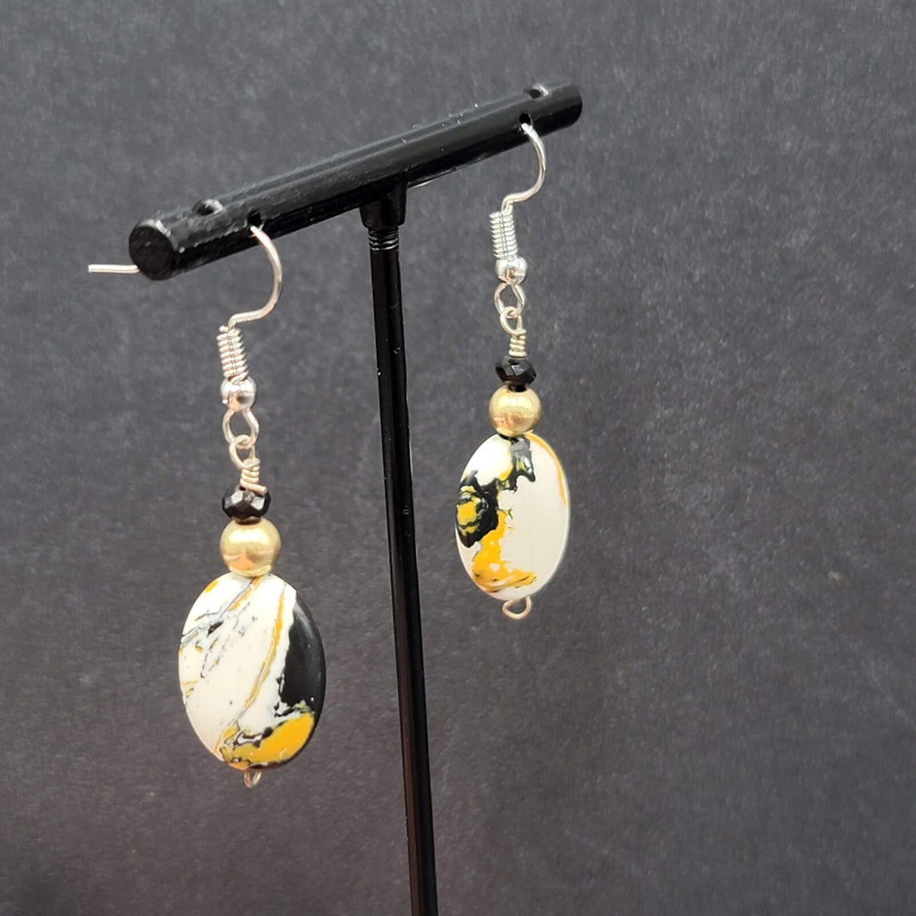 Pierced Earrings Silver tone Black White Yellow Art Glass Oval Bead Dangle 1.25"