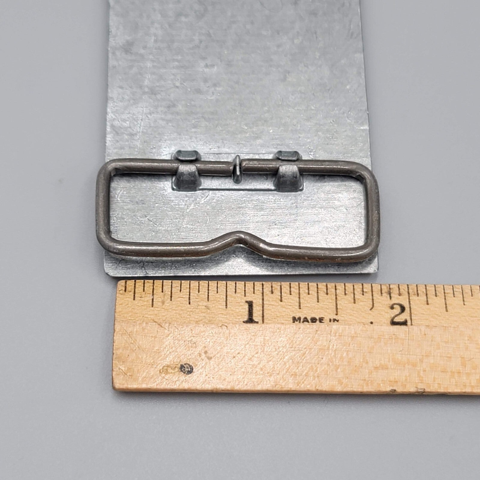 Exel Logistics Belt Buckle Shipping DHL supply chain company advertising