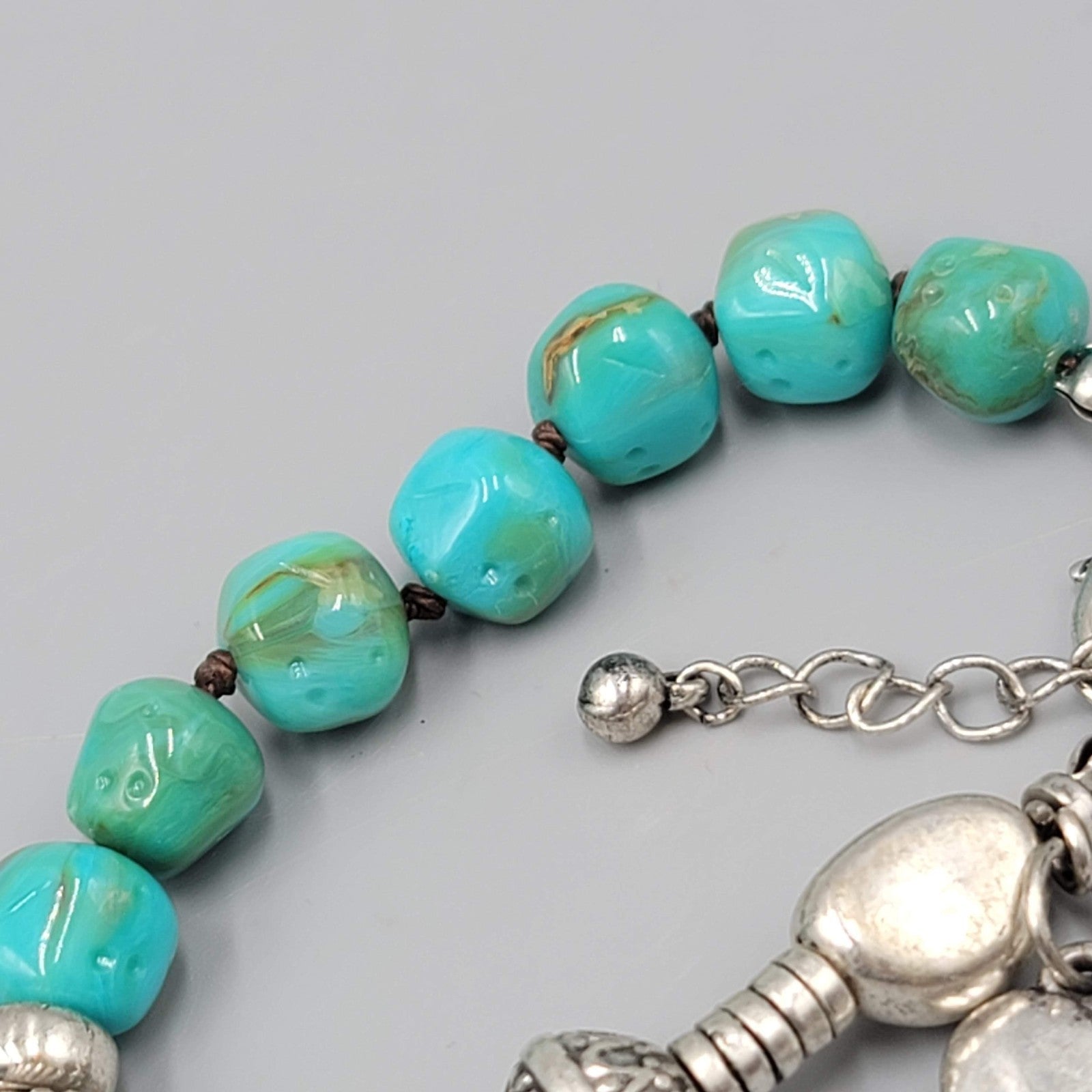 Louisa Bracelet Blue Pottery Bead Silver tone Feather Charm 6.75"-7.75"